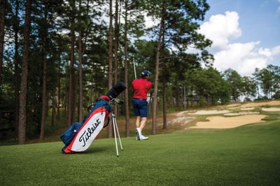High-quality golf equipment including clubs, balls, and a stylish bag, perfect for enhancing your game on the course.