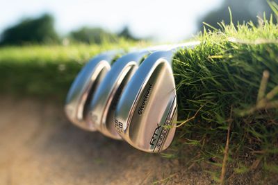 The wedge features an angled clubhead designed for high-loft shots, ideal for short-distance approaches and bunker play.