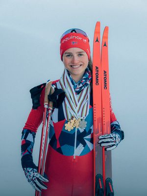 Cross-country ski equipment including skis, poles, and boots, ideal for winter sports enthusiasts.