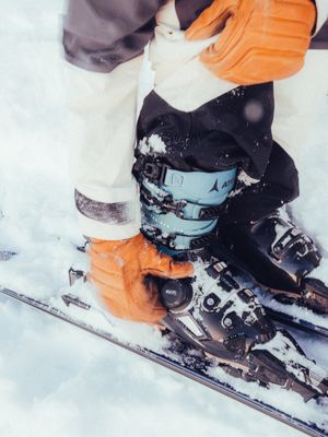 Alpine ski boots designed for warmth and support, ensuring peak performance and comfort for downhill skiing enthusiasts.