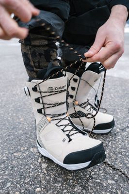 Snowboard boots with a snug fit, cushioned interior, and durable exterior for support, comfort, and control on the slopes.