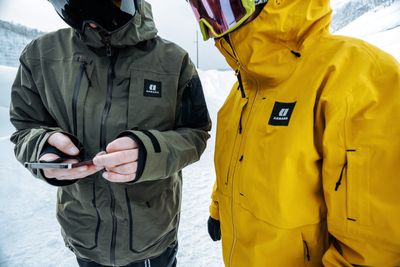 Men&#39;s winter jacket with insulated lining, and waterproof exterior designed for warmth and protection in cold weather.