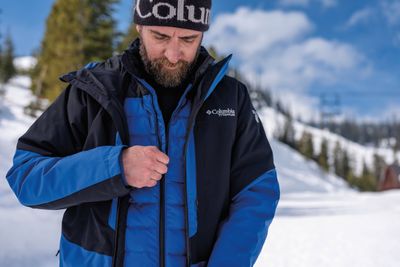 Men&#39;s jacket with a stylish design, and weather-resistant fabric, features multiple pockets, and a comfortable fit.