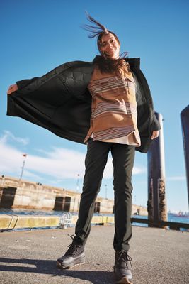 Women&#39;s apparel featuring brands like The North Face, Columbia, and Smartwool, offering outdoor-ready clothing with comfort and style.