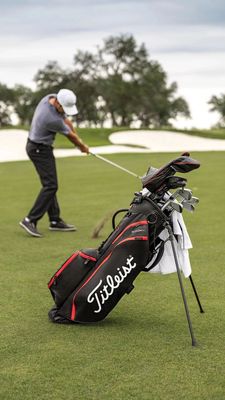 Various golf accessories including tees, ball markers, divot tools, and gloves, essential for a complete golfing experience.