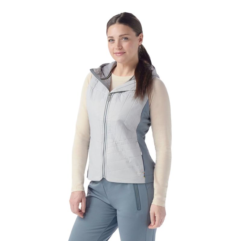 FRONT MODEL VIEW OF SMARTWOOL WOMENS SMARTLOFT VEST IN STORM GRAY WITH MERINO WOOL