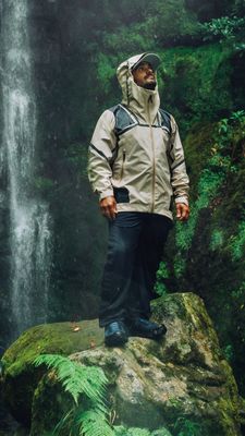 Men&#39;s rain pants for outdoor activities, showcasing waterproof, durable material and a comfortable fit, perfect for adventures.