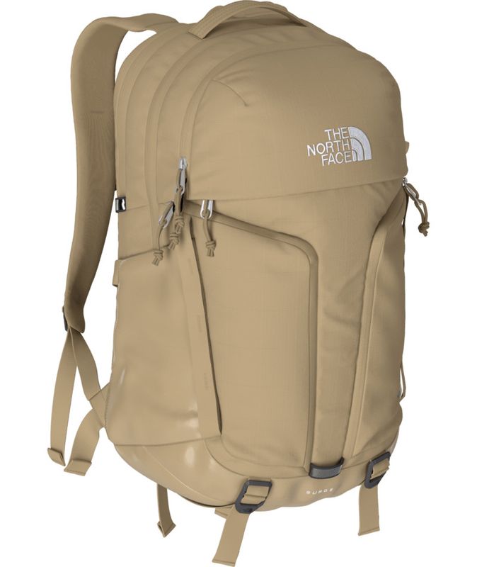 SIDE VIEW OF THE NORTH FACE WOMENS SURGE BACKPACK WITH LARGE MAIN COMPARTMENT FOR BOOKS AND 16&#39;&#39; LA…