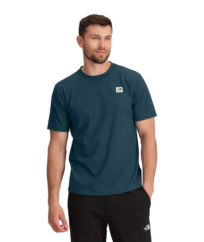 FRONT MODEL VIEW OF THE NORTH FACE MENS HERITAGE PATCH HEATHERED SHORT SLEEVE SHIRT WITH RIB ON COL…
