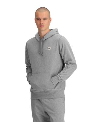 FRONT MODEL VIEW OF THE NORTH FACE MENS HERITAGE PATCH PULLOVER HOODIE WITH KANGAROO HAND POCKET AN…