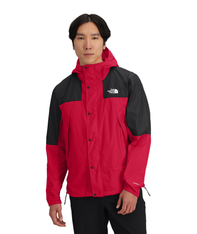 FRONT VIEW OF THE NORTH FACE MENS MOUNTAIN WINDBREAKER JACKET WITH WIND-RESISTANT FABRIC