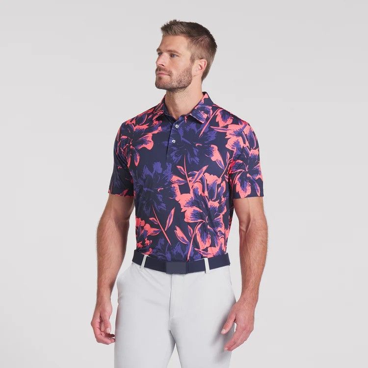 FRONT VIEW OF PUMA MENS MATTR BROKEN FLOWER POLO WITH FAST-DRYING AND MOISTURE-WICKING