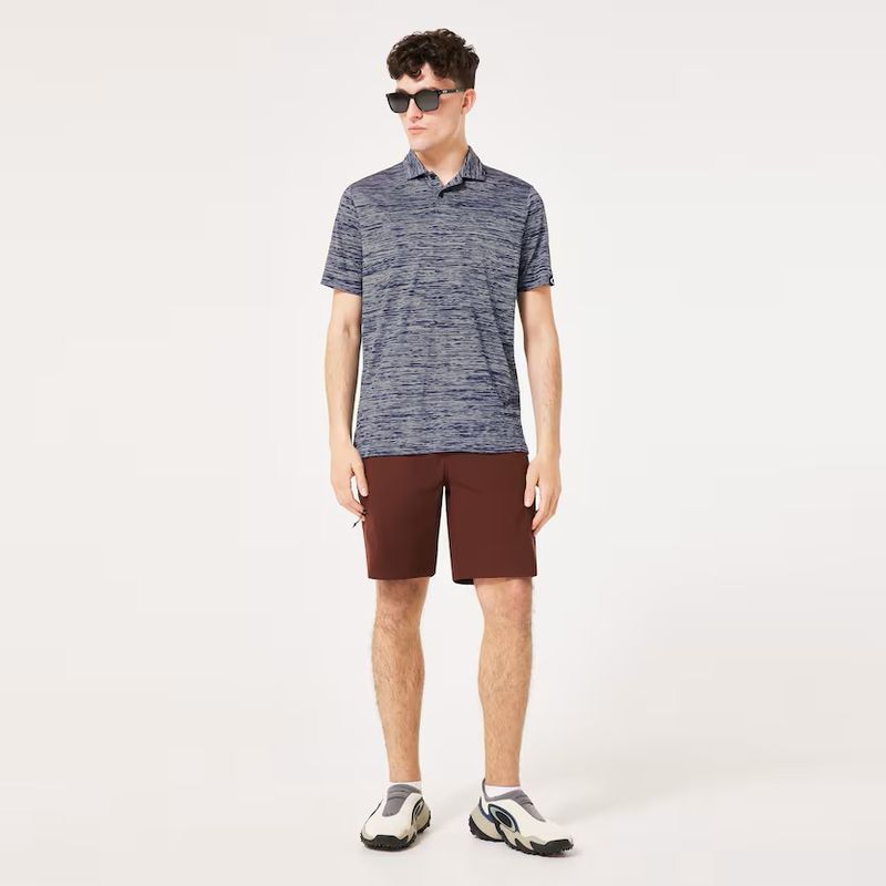 FRONT VIEW OF OAKLEY MENS GRAVITY PRO POLO WITH BREATHABILITY AND FREEDOM OF MOVEMENT
