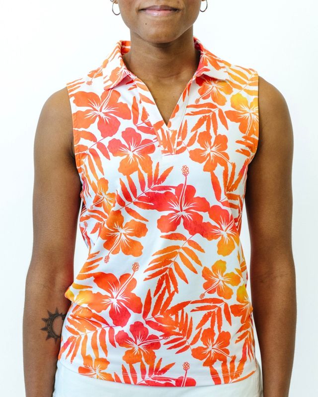FRONT VIEW OF YATTA WOMENS ALOHA SUNRISE SLEEVELESS POLO WITH 4-WAY STRETCH AND MOISTURE WICKING