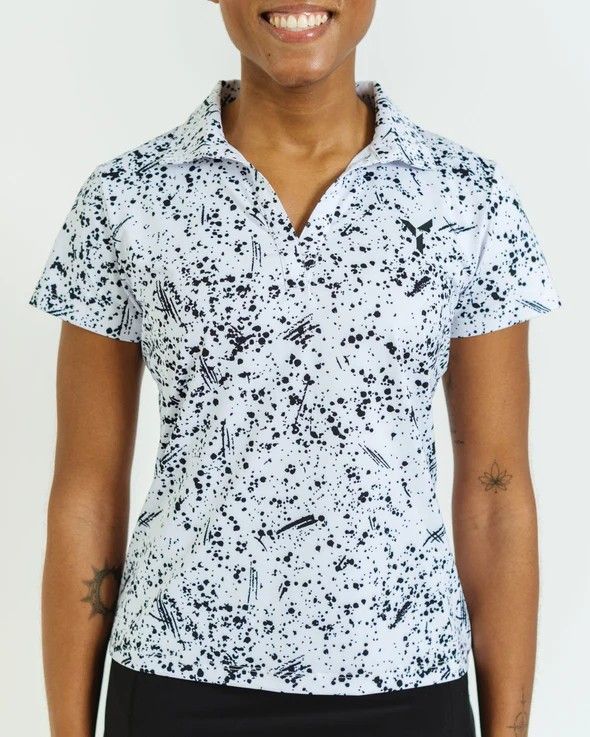 FRONT VIEW OF YATTA WOMENS COOKIES &amp; CREAM POLO WITH 4-WAY STRETCH AND MOISTURE WICKING
