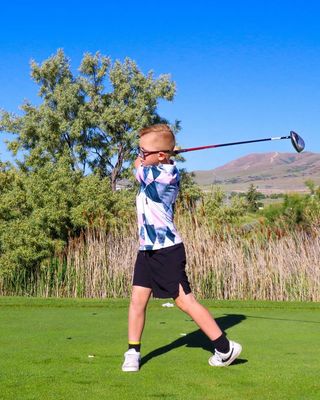 Youth golf polos designed with breathable fabric, athletic fit, and style to keep junior players confident on the course
