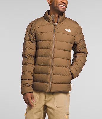 FRONT VIEW OF THE NORTH FACE MENS ACONCAGUA 3 WINTER JACKET FEATURES 600-FILL DOWN INSULATION AND W…