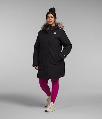 FRONT VIEW OF THE NORTH FACE WOMENS PLUS ARCTIC PARKA FEATURES 600-FILL DOWN INSULATION AND WATER R…