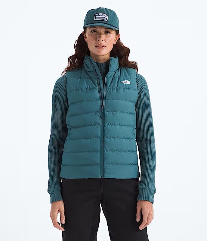 FRONT VIEW OF THE NORTH FACE WOMENS ACONCAGUA 3 VEST FEATURES 600-FILL DOWN INSULATION AND GREAT FO…