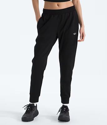FRONT VIEW OF THE NORTH FACE WOMENS TNF™ PERFORMANCE FLEECE SWEATPANT FEATURES STRETCH FABRIC AND A…