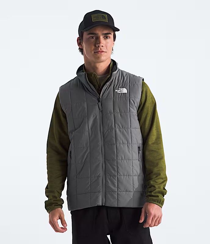 FRONT VIEW OF THE NORTH FACE MENS JUNCTION INSULATED VEST FEATURES LIGHTWEIGHT INSULATION AND WATER…