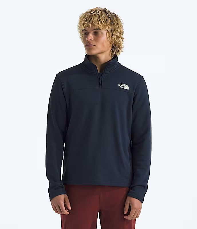 FRONT VIEW OF THE NORTH FACE MENS CEDAR TRAIL GRID FLEECE ¼ ZIP SWEATER FEATURES SOFT FLEECE FABRIC…
