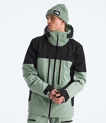 FRONT VIEW OF THE NORTH FACE MENS CHAKAL WINTER JACKET FEATURES WATERPROOFING AND HELMET-COMPATIBLE…