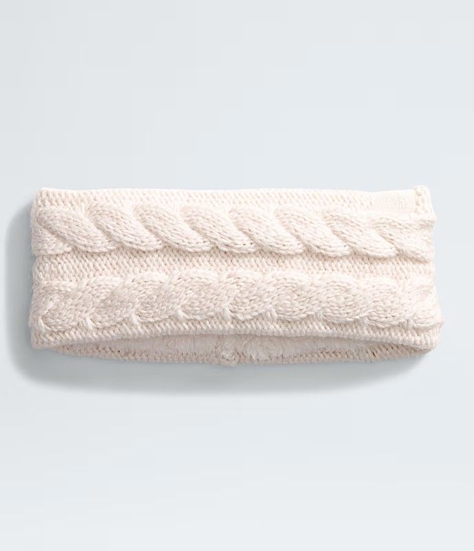FRONT VIEW OF THE NORTH FACE WOMENS OH MEGA HEADBAND FEATURES ULTRA-COZY SHERPA FLEECE LINING AND C…