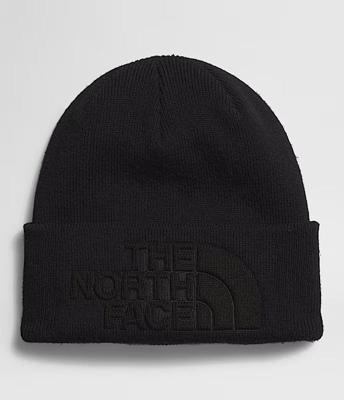 FRONT VIEW OF THE NORTH FACE UNISEX URBAN EMBOSSED BEANIE WINTER HAT FEATURES ROOMY FIT AND COLD-WE…