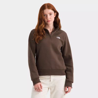 FRONT VIEW OF THE NORTH FACE WOMENS EVOLUTION SIMPLE DOME ¼ ZIP SWEATER FEATURES SPLIT KANGAROO HAN…