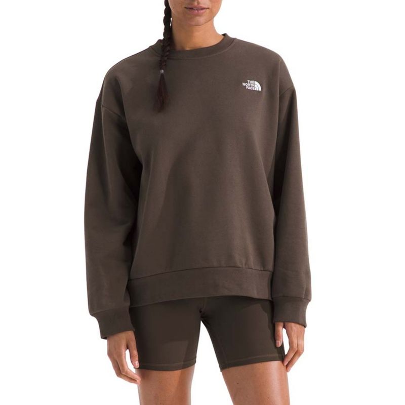 FRONT VIEW OF THE NORTH FACE WOMENS EVOLUTION SIMPLE DOME OVERSIZED CREW SWEATER FEATURES OVERSIZED…