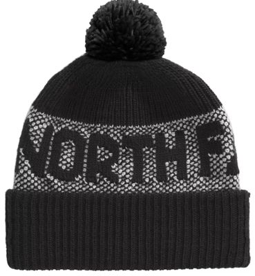 FRONT VIEW OF THE NORTH FACE UNISEX RETRO CABIN BEANIE WINTER HAT FEATURES ROOMY FIT AND ADDED WARM…