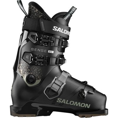 SIDE VIEW OF SALOMON MENS SENSE 80 GW DOWNHILL SKI BOOT FEATURES SOFT FLEX AND GRIPWALK SOLES FOR E…