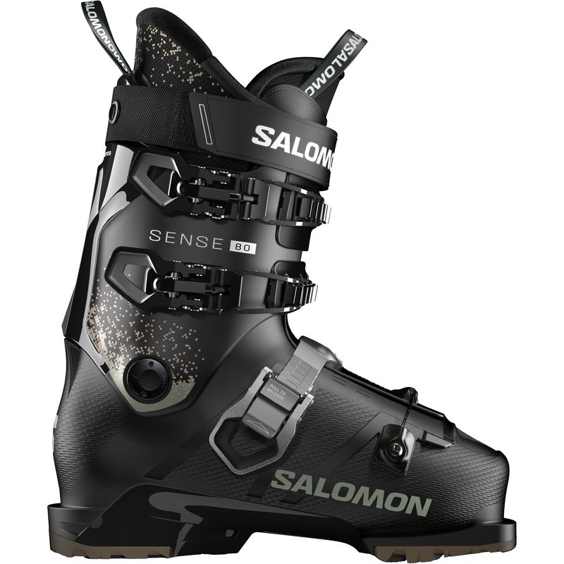 SIDE VIEW OF SALOMON MENS SENSE 80 GW DOWNHILL SKI BOOT FEATURES SOFT FLEX AND GRIPWALK SOLES FOR E…