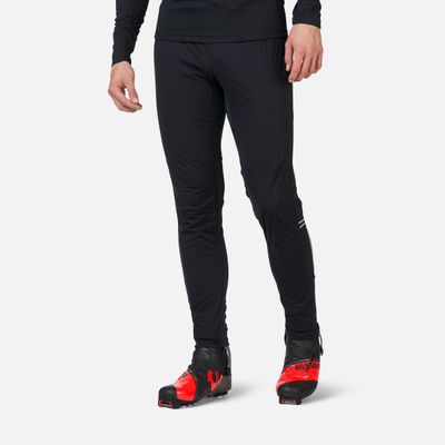 FRONT VIEW OF ROSSIGNOL MENS POURSUITE PANT FEATURES PERFORMANCE STRETCH FABRIC AND DURABLE WATER R…