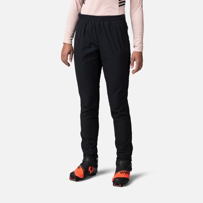 FRONT VIEW OF ROSSIGNOL WOMENS ACTIVE VERSATILE XC PANT FEATURES PERFORMANCE STRETCH FABRIC AND PAC…