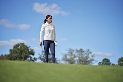 Durable and stylish women's golf outerwear, designed for warmth, comfort, and peak performance in all weather conditions.