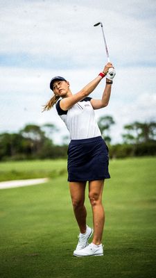 Stylish women’s golf apparel including polos, skirts, and caps, combining fashion with breathable, moisture-wicking fabrics.