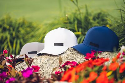 Men's golf hats feature comfortable, breathable materials, adjustable fits, and stylish designs for sun protection