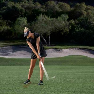 Women’s golf dress with athletic fit, breathable fabric, and stylish design for high-performance play on and off the course.