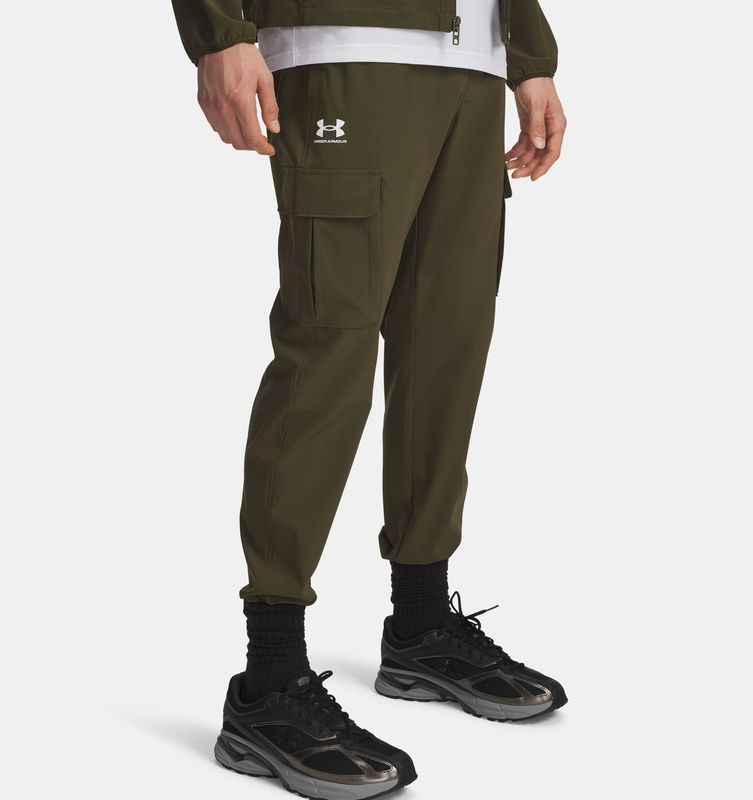 FRONT VIEW OF UNDER ARMOUR MENS UA VIBE WOVEN CARGO PANT FEATURES 4-WAY STRETCH FOR EASY MOVEMENT A…