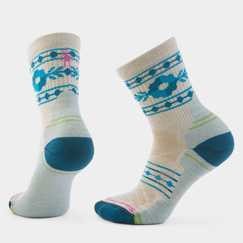 FRONT VIEW OF SMARTWOOL WOMENS HIKE LIGHT CUSHION RETRO FLORAL MID CREW SOCKS FEATURES ENHANCED DUR…