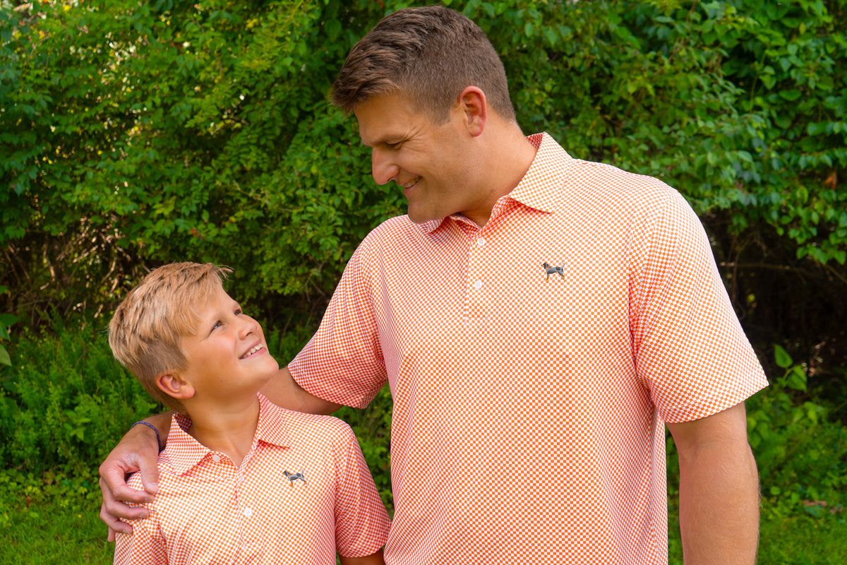 Volunteer Traditions Bluetick Checkerboard Kids Polo, Color: Orange, Size: YS