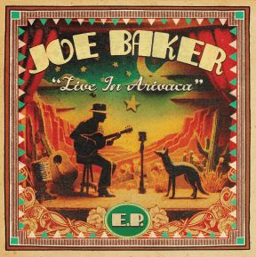 Record sleeve artwork with the silhouette of a man playing guitar with a coyote watching, while on stage in a desert setting.