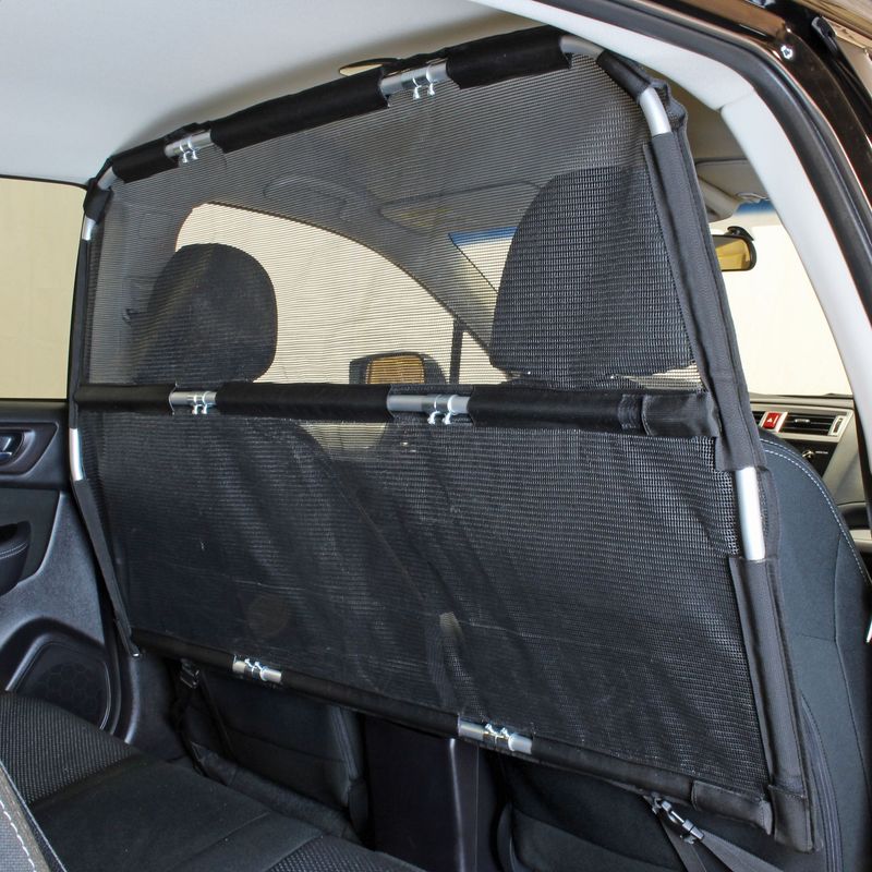 Bushwhacker Dog Barrier Installed Behind Front Seat of Vehicle