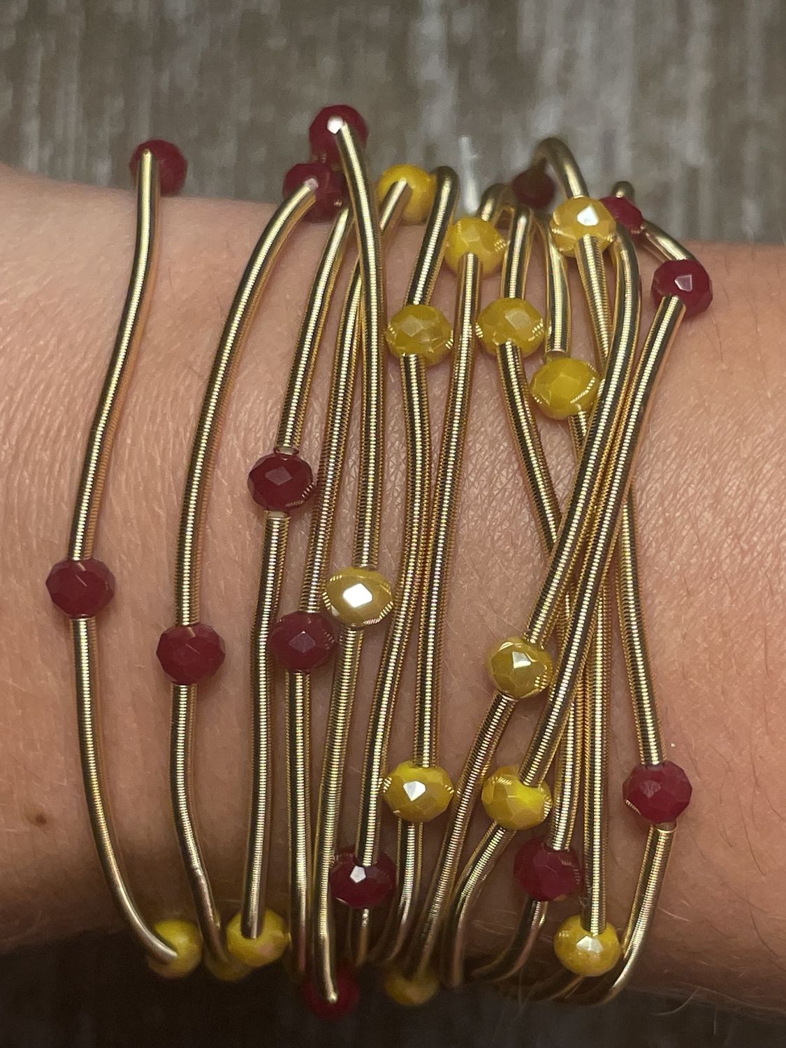 Garnet and Gold 10 Set Of Bracelets