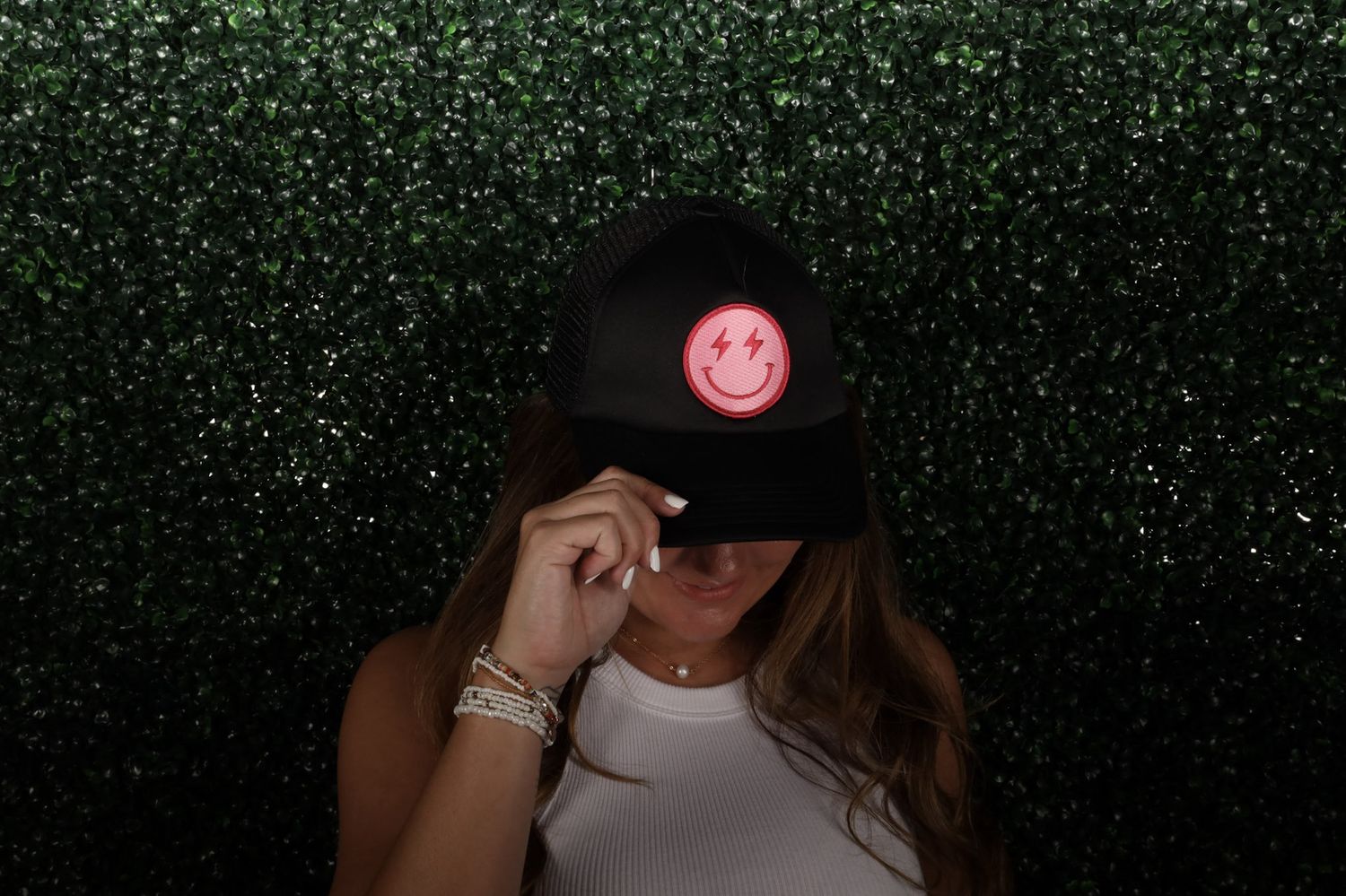 Black/Pink Crazy Bolts Smiley Patch Trucker Hat
