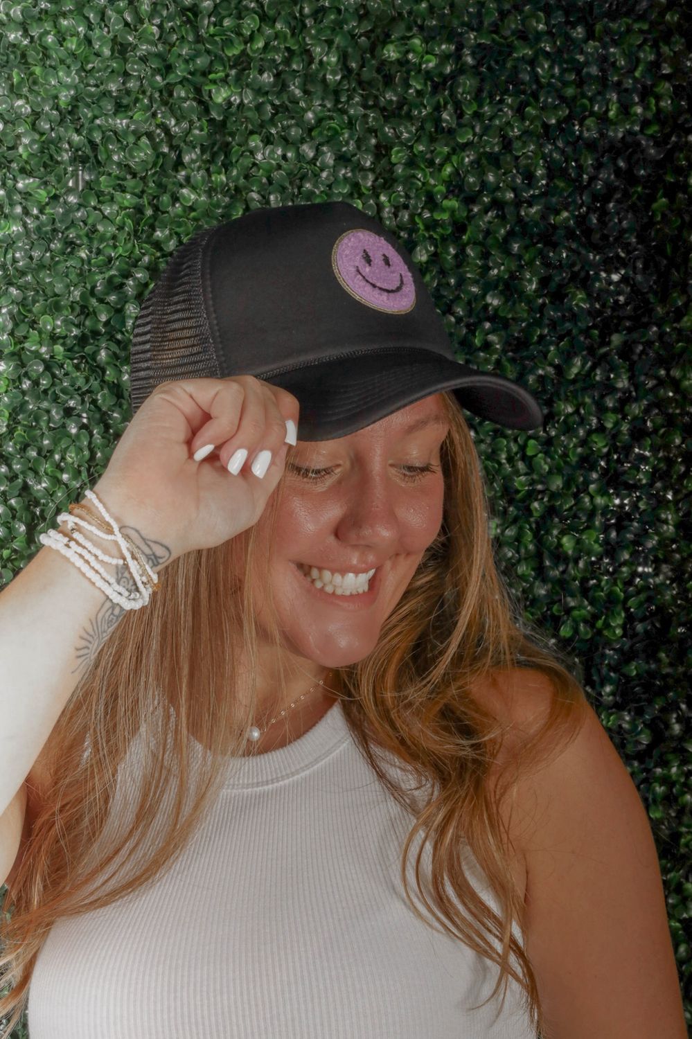 Black + Purple Smiley Patch Trucker Hat