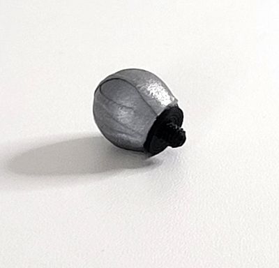 A close-up photo of a motion capture cluster marker with M4 screw for use with a cluster plate
