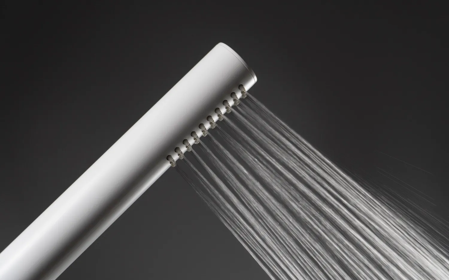 Pommeau de douche à main Deante Silia avec jet d'eau, finition blanche mate, avec support intégré.